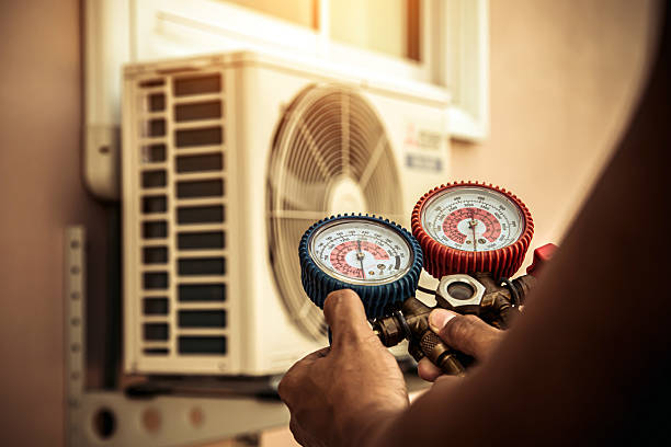 Professional Ductwork Repair technician working in Warren, RI